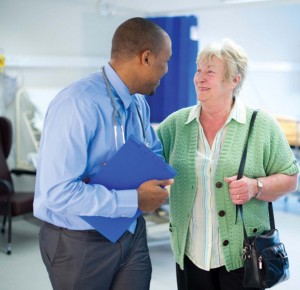 Doctor speaking with patient